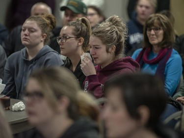 Community members listen during a press conference at the Elgar Petersen Arena in Humboldt, Sask., on Saturday, April 7, 2018.