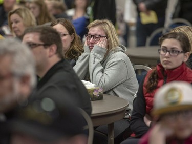 Community members listen during a press conference at the Elgar Petersen Arena in Humboldt, Sask., on Saturday, April 7, 2018.