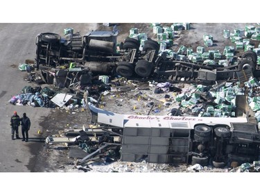 The wreckage of a fatal crash outside of Tisdale, Sask., is seen Saturday, April, 7, 2018.