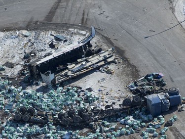 The wreckage of a fatal crash outside of Tisdale, Sask., is seen Saturday, April, 7, 2018.