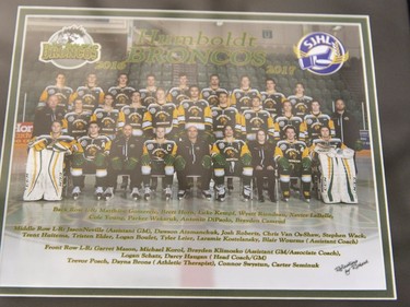 A team photo of the 2016-2017 Humboldt Broncos hockey team hangs in Elgar Petersen Arena in Humboldt, Sask., on Saturday, April 7, 2018.