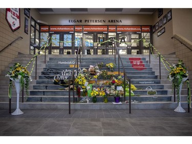 A memorial at the stairs that lead to Elgar Petersen Arena is shown in Humboldt, Sask., on Saturday, April 7, 2018.