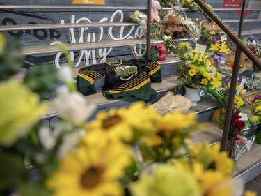 A memorial at the stairs that lead to Elgar Petersen Arena is shown in Humboldt, Sask., on Saturday, April 7, 2018.