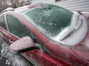 Lots of ice on cars and everything else Monday morning.  Photo by Wayne Cuddington/ Postmedia