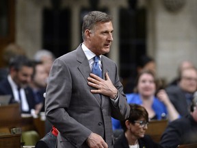 Conservative MP Maxime Bernier rises during Question Period in the House of Commons on Parliament Hill in Ottawa on Thursday, April 19, 2018.