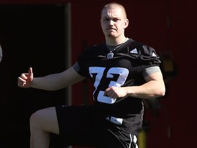 Lewis Ward of the Ottawa Redblacks limbers up during their mini camp at TD Place in Ottawa, April 23, 2018. (Jean Levac/Postmedia)