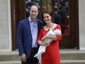 Britain's Prince William and Kate, Duchess of Cambridge pose for a photo with their newborn baby son as they leave the Lindo wing at St Mary's Hospital in London on April 23, 2018.