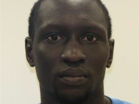 Sunday Muwat is described as a black male, 26 years of age, 6'3" (191cm), 170 lbs (77kg) with black hair and brown eyes.