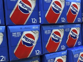 In this Monday, April 23, 2018, photo, Pepsi soft drink cases are stacked on display at a store in Londonderry, N.H. PepsiCo Inc. reports earns on Thursday, April 26.