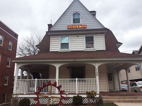 This Wednesday, April 18, 2018 photo shows the Theta Tau fraternity house in Syracuse, N.Y. Syracuse University Chancellor Kent Syverud announced the fraternity was suspended over videos with racist, sexist content. Syverud, described the video involving members of Theta Tau, a professional engineering fraternity, as racist, anti-Semitic, homophobic, sexist and hostile to people with disabilities. He said the videos were turned over to the school's Department of Public Safety for possible disciplinary or legal action.
