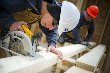 As well as helping to frame a house as part of the SHSM program, 18-year-old student Jesse Ottens is now working with Mattamy Homes on weekends.