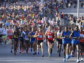 Runners, including competitors in the elite categories, leave the start on Elgin Street as they take part in the half marathon during the Ottawa Race Weekend, on Sunday, May 28, 2017.