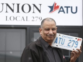 Yogi Sharma with his plate. Sharma, an assistant business agent with the Amalgamated Transit Union and a former bus driver with OC Transpo, has long coveted a plate that says just ATU.