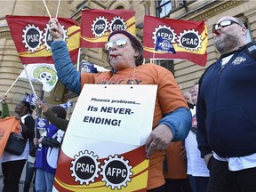 Public servants protest  the Phoenix pay system outside the Prime Minister's Office last fall.