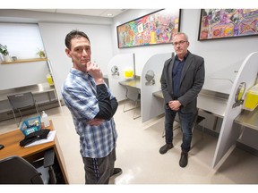 Community worker J.P. Leblanc (L) and Rob Boyd, the head of the Oasis harm-reduction program at the Sandy Hill Community Health Centre inside the new supervised injection site.