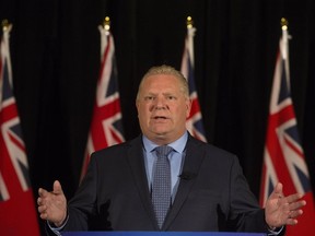 Ontario PC leader Doug Ford speaks to the media regarding the cost of firing the board and CEO of Ontario Hydro a week after he declared at a press conference that the firings would be his first act if elected Premier of Ontario in the next election.  Toronto, Ont. on Thursday April 19, 2018. Stan Behal/Toronto Sun/Postmedia Network