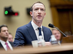 Facebook's Mark Zuckerberg speaks during a House hearing on April 11, 2018.