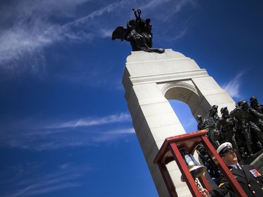 The Anniversary of the Battle of the Atlantic Ceremony to commemorate the sacrifices made by thousands of Canadians who fought in the North Atlantic took place in Ottawa Sunday May 6, 2018, at the National War Memorial. Master Seaman Ryan Clifford rang the bell as the announced those lost.   Ashley Fraser/Postmedia