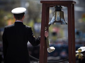 This photo shows the 2018 Battle of the Atlantic Ceremony to commemorate the sacrifices made by thousands of Canadians who fought in the North Atlantic. The photo taken at the National War Memorial shows Master Seaman Ryan Clifford who rang the bell in honor of those lost. Ashley Fraser/Postmedia