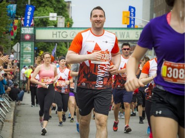 Jonathan Ward along with thousands of runners at the start of the 5K race Saturday May 26, 2018 at Ottawa Race Weekend.