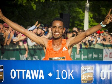 Andamlak Berta of Ethiopia, the winner of the 10K race, crosses the finish line Saturday May 26, 2018 at Ottawa Race Weekend.