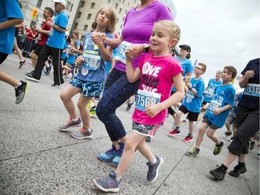 Runners take part in the 2K race Saturday May 26, 2018 at Ottawa Race Weekend.