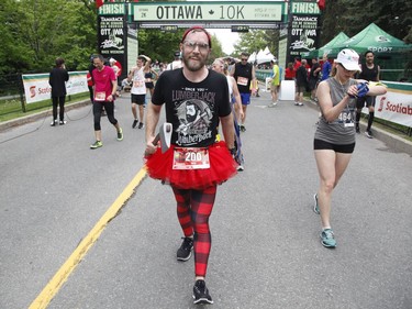 Nick Jankowski of Ottawa finishes the 5k at the Ottawa Race Weekend on Saturday, May 26, 2018.
