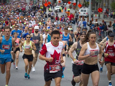 Runners start the marathon Sunday May 27, 2018 at Ottawa Race Weekend.    Ashley Fraser/Postmedia