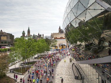 Runners make their way along Colonel By Drive during the marathon Sunday May 27, 2018 at Ottawa Race Weekend.    Ashley Fraser/Postmedia