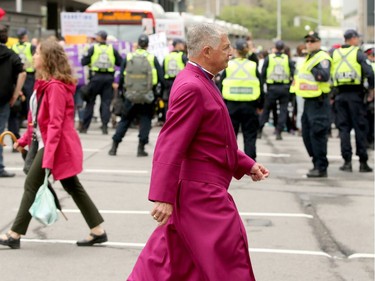 Carrying pro-life placards, singing songs and chants, thousands of people paraded through downtown Ottawa Thursday (May 10, 2018) for the March for Life rally. They were met by a few hundred vocal pro-choice protesters at some intersections, but the two groups were kept separated by a strong police presence.