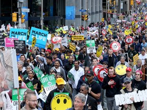 Carrying anti-abortion placards, singing songs and chants, thousands of people paraded through downtown Ottawa Thursday (May 10, 2018) for the March for Life rally.