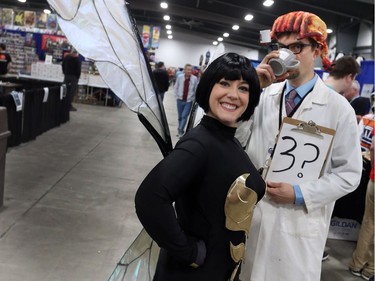 Robin (L) and John Laska dressed as the Wasp and Gordon Freeman of Half Life during the opening day of Comiccon, May 11, 2018.