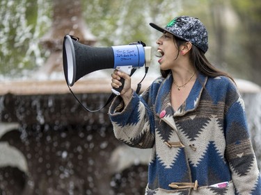 A Pro-Choice supporter shouts into a megaphone in Confederation Park before joining a group that confronted and briefly blocked the annual March for Life in Ottawa Thursday, May 10, 2018.