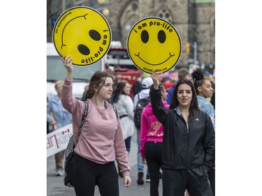 Pro-Life supporters show their supporter after Pro-Choice protestors blocked the annual March for Life in Ottawa Thursday, May 10, 2018.