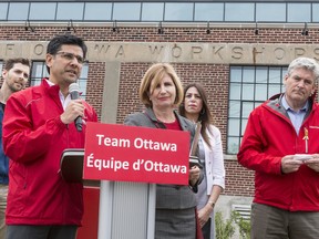 Ottawa Centre Liberal candidate Yasir Naqvi speaks as fellow candidates (L-R) Nathalie Des Rosiers (Ottawa-Vanier), Stephanie Maghnam (Kanata-Carleton), and John Fraser (Ottawa-South) and Gareth Davies, Founder, Maker House Company (far left), listen during a press conference where Ottawa area Liberals highlighted their job creation record in the capital. May 15, 2018.