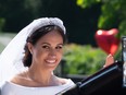 Prince Harry, Duke of Sussex and Meghan, Duchess of Sussex leave Windsor Castle in the Ascot Landau carriage during a procession after getting married at St. George's Chapel in Windsor, Berkshire.