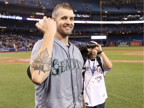 James Paxton #65 of the Seattle Mariners shows off his maple leaf tattoo after throwing a no-hitter during MLB game action against the Toronto Blue Jays at Rogers Centre on May 8, 2018 in Toronto, Canada.