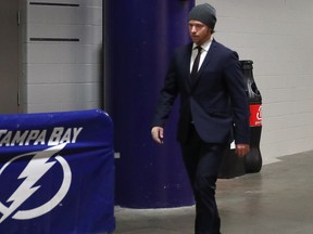 TAMPA, FL - MAY 11: Nicklas Backstrom #19 of the Washington Capitals arrives with a bandaged right hand prior to the game against the Tampa Bay Lightning in Game One of the Eastern Conference Finals during the 2018 NHL Stanley Cup Playoffs at the Amalie Arena on May 11, 2018 in Tampa, Florida.