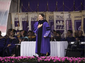 NEW YORK, NY - MAY 16: Canadian Prime Minister Justin Trudeau acknowledges the crowd after receiving an honorary doctor of laws degree at New York University's commencement ceremony at Yankee Stadium, May 16, 2018 in the Bronx borough of New York City. Trudeau delivered a commencement address to the graduating class of 2018.