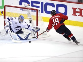 WASHINGTON, DC - MAY 17:  Nicklas Backstrom #19 of the Washington Capitals takes a shot on Andrei Vasilevskiy #88 of the Tampa Bay Lightning during the second period in Game Four of the Eastern Conference Finals during the 2018 NHL Stanley Cup Playoffs at Capital One Arena on May 17, 2018 in Washington, DC.