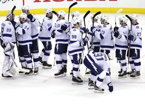 WASHINGTON, DC - MAY 17:  Andrei Vasilevskiy #88 of the Tampa Bay Lightning celebrates with his teammates after defeating the Washington Capitals in Game Four of the Eastern Conference Finals during the 2018 NHL Stanley Cup Playoffs at Capital One Arena on May 17, 2018 in Washington, DC.