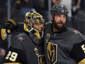 Marc-Andre Fleury #29 of the Vegas Golden Knights is congratulated by his teammate Deryk Engelland #5 of the Vegas Golden Knights after their team's win against the Winnipeg Jets in Game Four of the Western Conference Finals during the 2018 NHL Stanley Cup Playoffs at T-Mobile Arena on May 18, 2018 in Las Vegas, Nevada. The Golden Knights defeated the Jets 3-2.