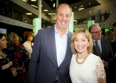 Ron Smith, managing director of sales in Canada for Yorkville Asset Management and Algonquin College president Cheryl Jensen.