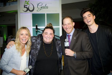 Algonquin College alumni Angie Poirier and Stuntman Stu Schwartz from the MAJIC 100 Morning Show posed for a photo with The Launch winners Elijah Woods (right) and Jamie Fine (second from left).