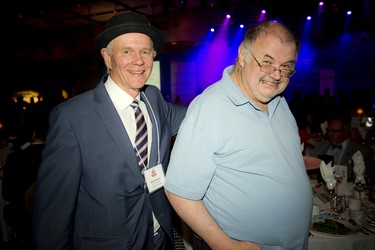 Mike Murphy, a member of the board of directors of Citizen Advocacy Ottawa, with Joe Donegan.