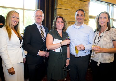 From left, lawyer Pamela Machado, Ottawa Police Association president Matt Skof, Lisa MacIntyre with IRCC, Brent MacIntryre with Ottawa Police Service and Amy Bond with Ottawa Police Service.