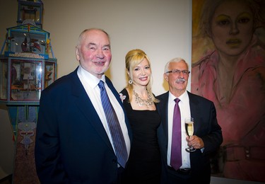 From left, artist Alex Wyse, Alexandra Badzak, director and CEO of the Ottawa Art Gallery, and Lawson Hunter, chair of the board.