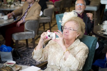 Ninety-two-year-old Elizabeth Hewitt, who is two weeks older than Queen Elizabeth and jokes the queen stole her name, was taking photos of the television during the wedding ceremony.