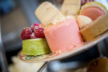 Delicious desserts of lemon and lavender shortbread, sweet pea and raspberry Victoria sponge, elderflower and strawberry yogurt mousse, raspberry and almond Bakewell tartlet, and Battenberg macaron.
