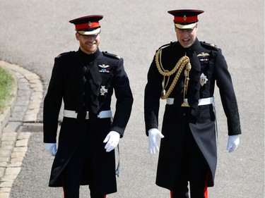 Britain's Prince Harry (L), Duke of Sussex, arrives with his best man Prince William, Duke of Cambridge (R), at St George's Chapel, Windsor Castle, in Windsor, on May 19, 2018 for his wedding ceremony to marry US actress Meghan Markle.